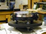 Cell with mirror in position, awaiting restraining cleats