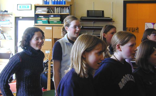 A subgroup of the pupils rehearsing