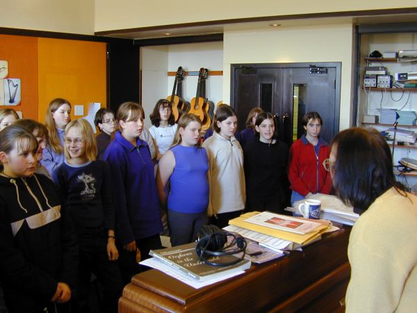 A subgroup of the pupils rehearsing