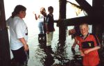 Messing about in wellies under the pier