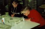 Pupils observing test-tubes