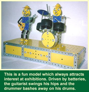 This is a fun model which always attracts interest at exhibitions. Driven by batteries, the guitarist swings his hips and the drummer bashes away on his drums.