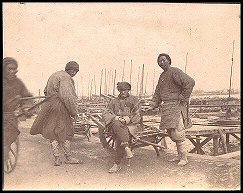 Wheelbarrow Men (58kb)