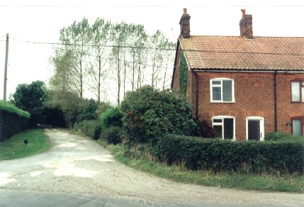 This loke is metalled for about a furlong, and used to continue across the fields and swing round to meet the Attleborough - Diss road.