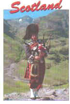 A colourful piper playing in the Highlands