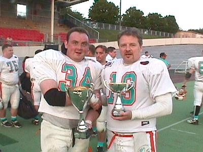 Two veterans of the Britball game, Steve Wooton and Gary Marshall, savour the moment together.