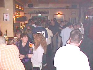 The crowded bar at "The Schooner".