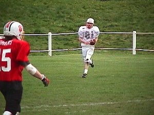 Iain Mullins with the ball in the End Zone.