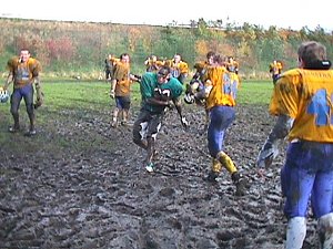 Senators' Dutch defender Wimmy van Tergouw, having been given a friendly mudbath by his compatriots!