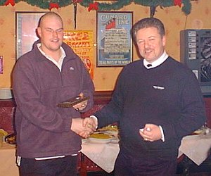 Sean Riley receives the Team Spirit award from Gary Marshall.