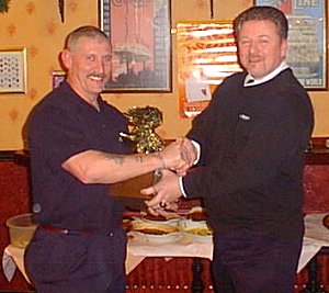 Mark Sloan receives the Players' Player award from Gary Marshall.