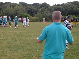 Gary Catherall #31 gets the defensive play from coach Mark Sloan