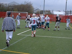 Officials keep their arms down as the Bulls are just short.