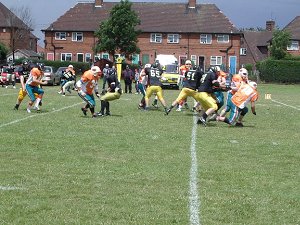 Steve Wooton tracks Albert Thompson in the backfield before stepping up to make the play