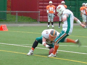Pete Rogers kicks the extra point